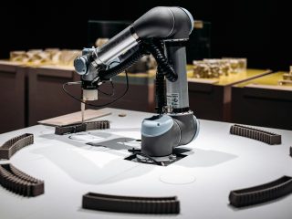 Robot industri sebagai ilustrasi penerapan AI pada manufaktur
